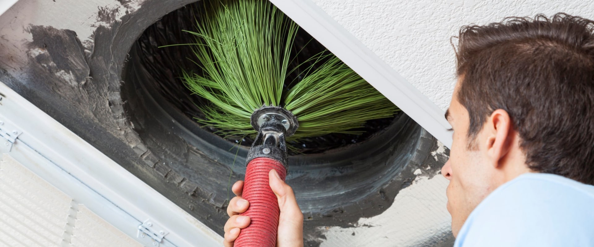 What is the Duct System Cleaning Process in an HVAC System?