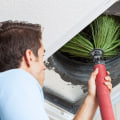 What is the Duct System Cleaning Process in an HVAC System?